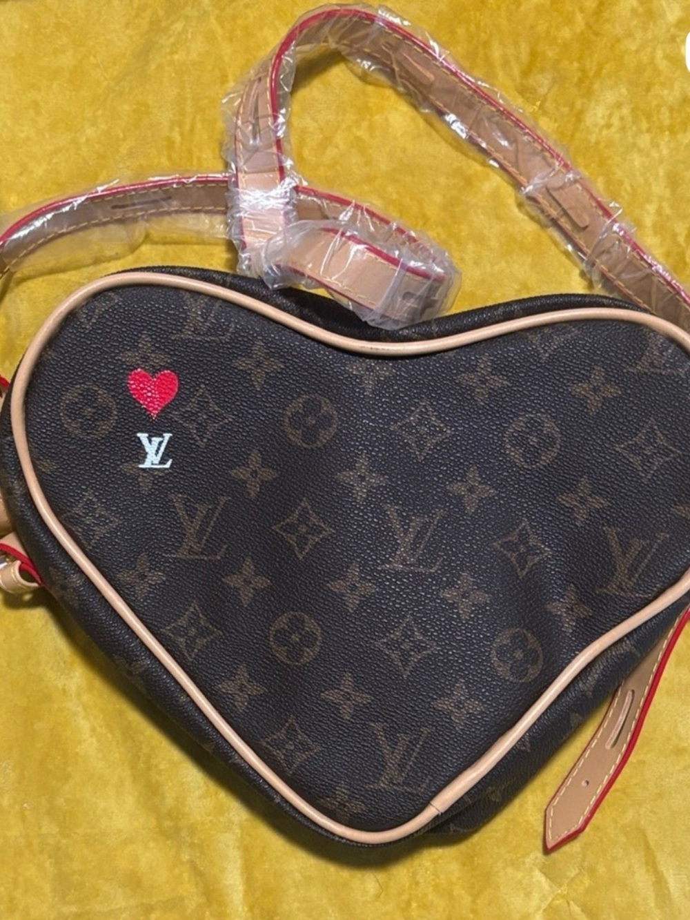 Louis Vuitton Heart-Shaped Monogram Crossbody Bag in Brown with Red Accent